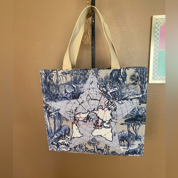 Dior Handbags - Limited Edition Dior “Around the World” tote book bag New (beauty dept)
